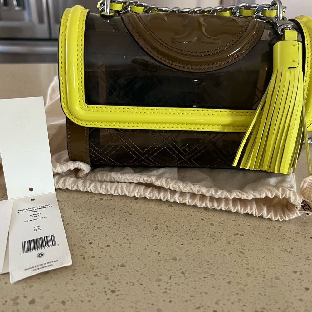 Tory Burch clear tassel bag. Brand new never worn bag with tag and dust bag.